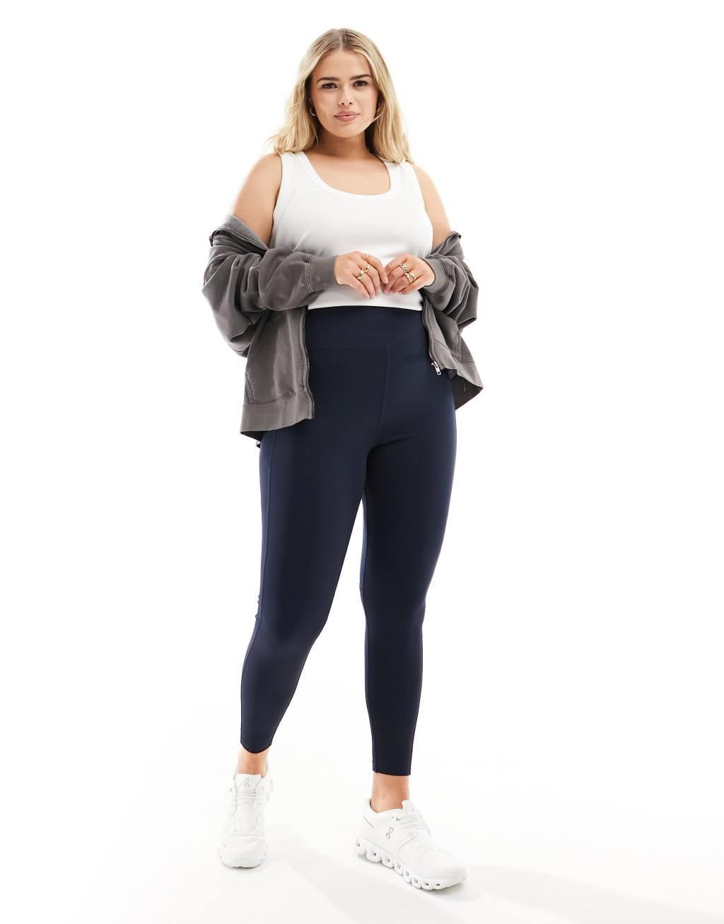 ASOS 4505 CurveIcon running tie waist gym leggings with phone pocket in navy Product Image