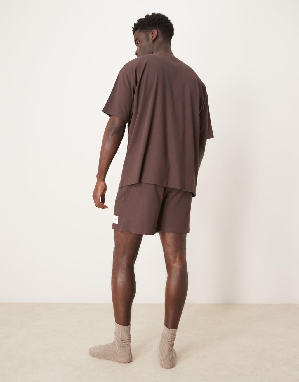 ASOS DESIGN ribbed T-shirt and shorts lounge set with embroidered patch in brown Product Image