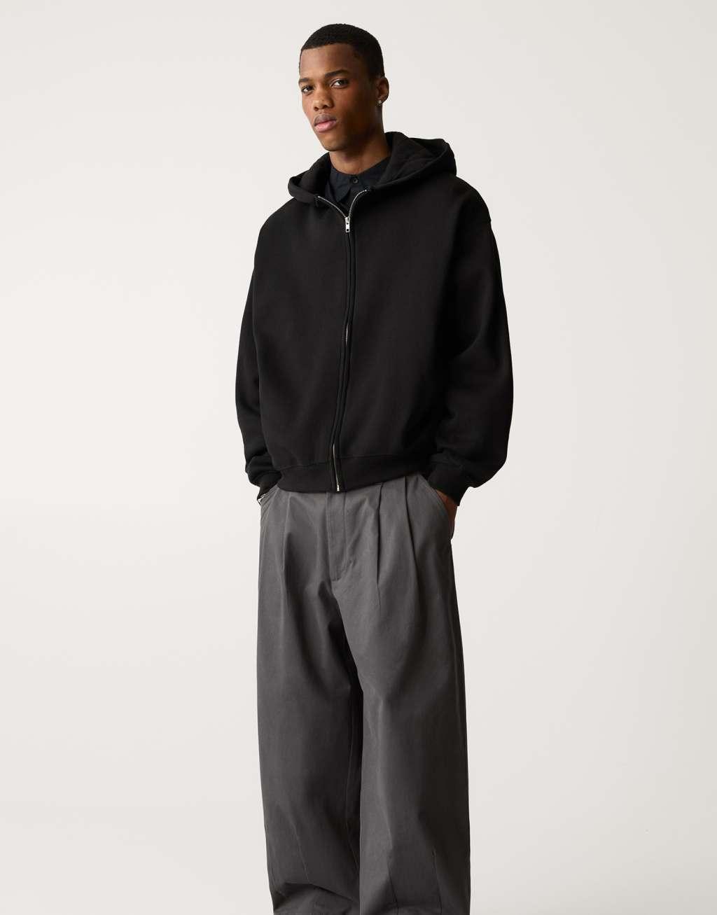 Pull&Bear zip through boxy fit hoodie in black Product Image