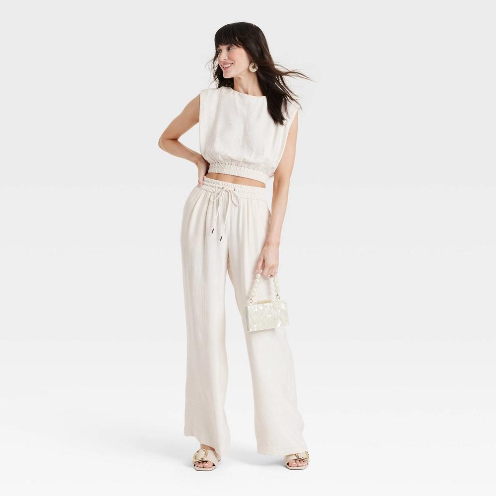 Women's High-Rise Modern Gauze Wide Leg Pull-On Pants - A New Day™ Cream S Product Image