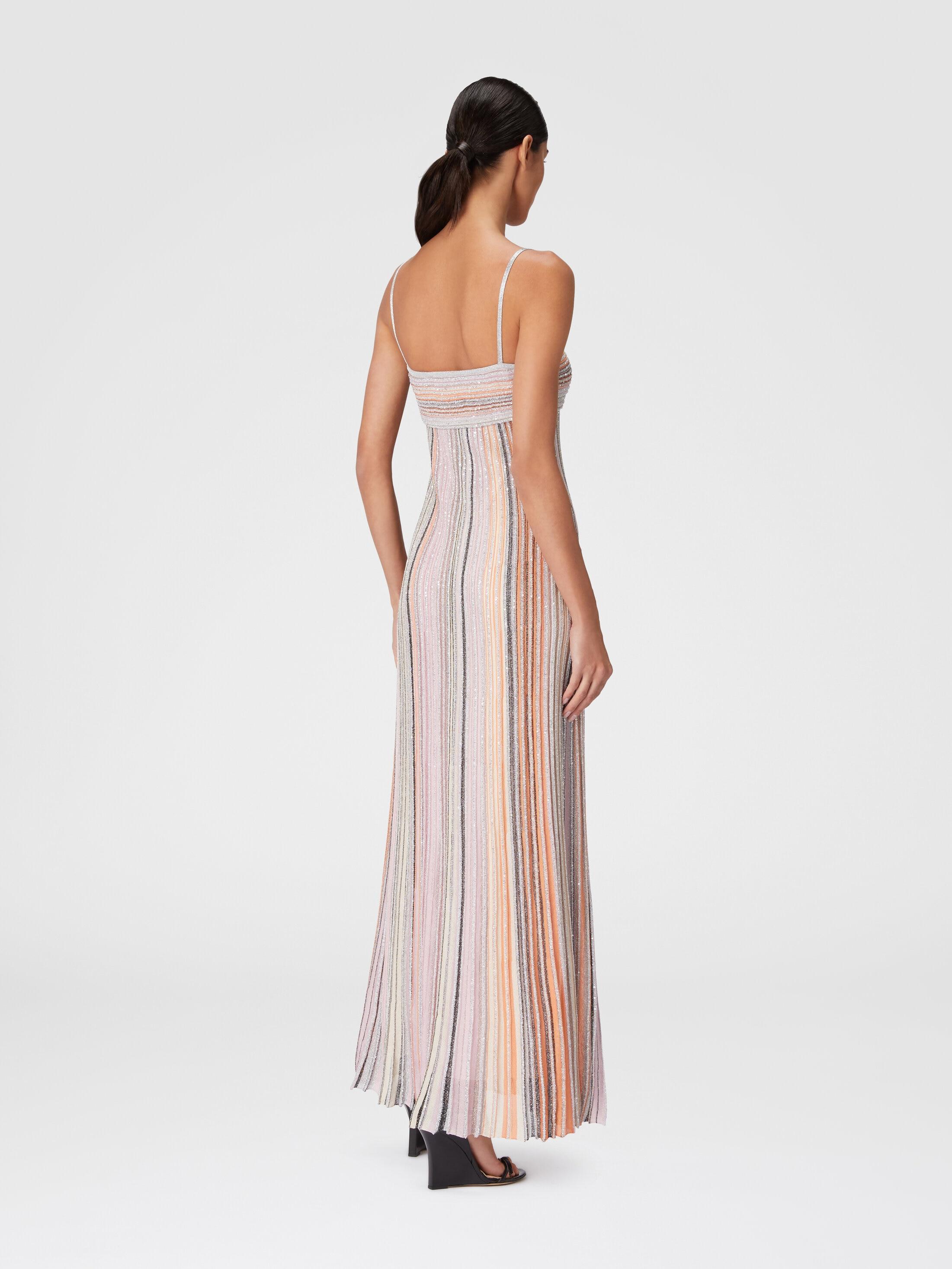 Long sleeveless dress in lamé pleated knit Product Image