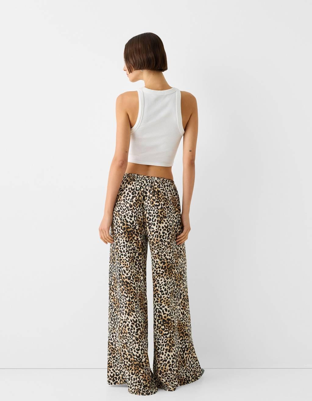 Bershka tie waist wide leg pants in leopard print Product Image