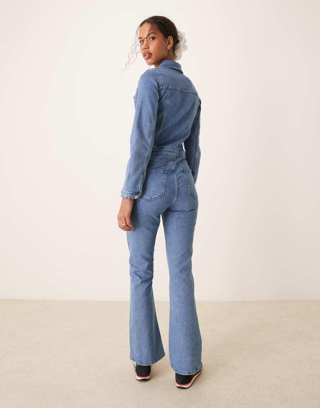 ASOS DESIGN denim long sleeve jumpsuit in mid blue Product Image