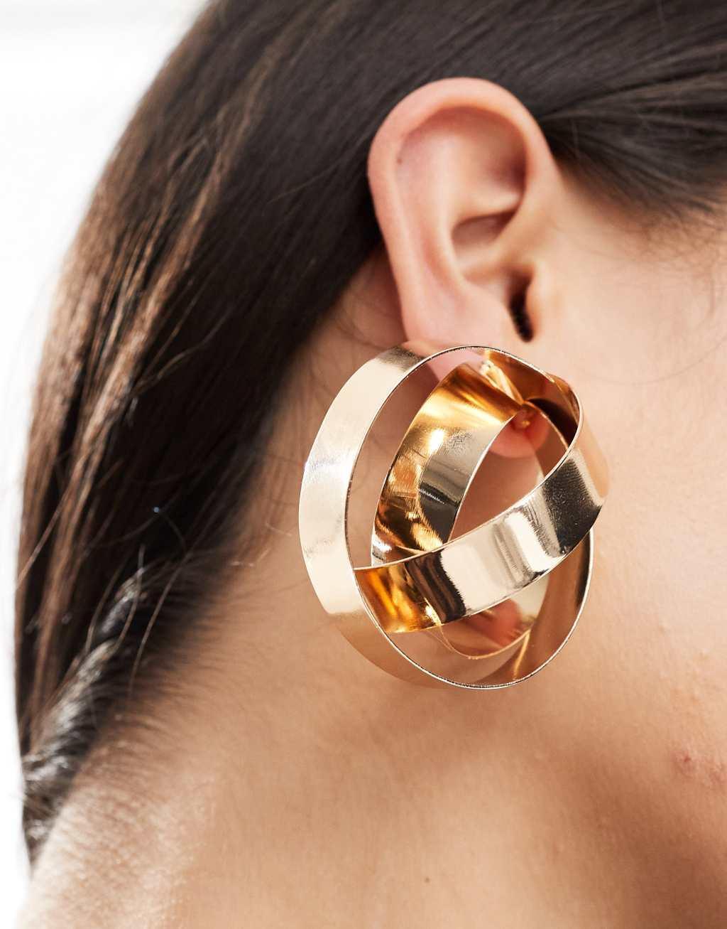 ASOS DESIGN oversized stud earrings with circle knot detail in gold tone Product Image