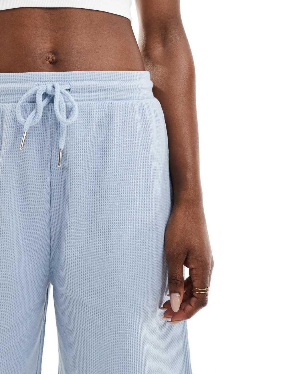 ASOS DESIGN waffle longline shorts in blue Product Image