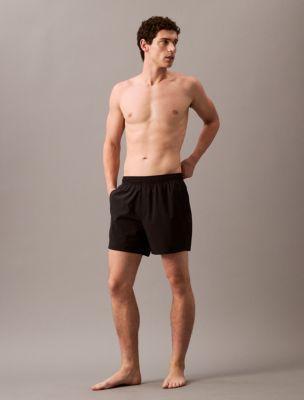 Logo Badge Solid Swim Shorts Product Image