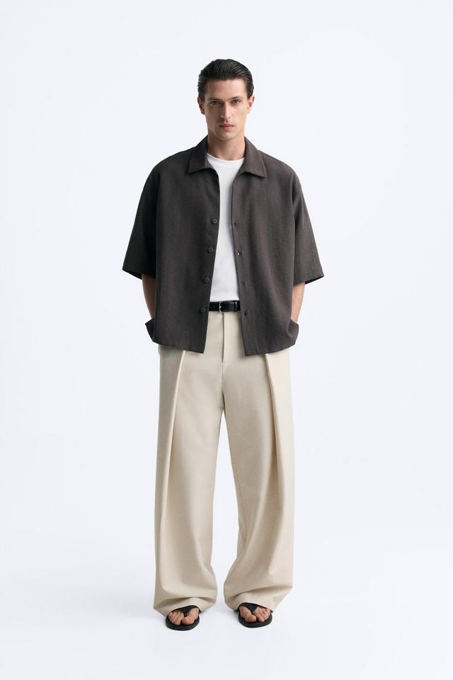 PLEATED WIDE FIT PANTS Product Image