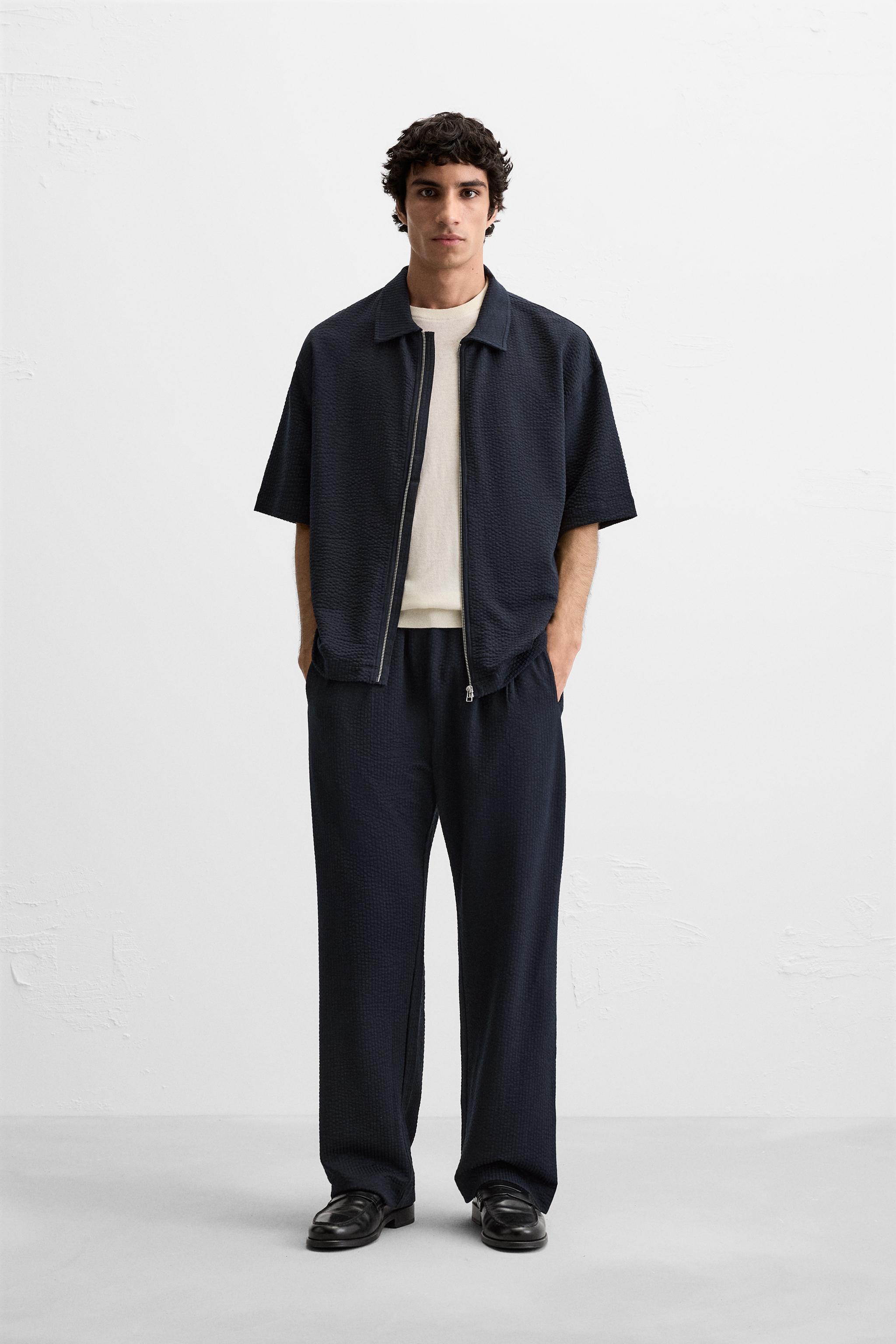 PLEATED SEERSUCKER PANTS Product Image