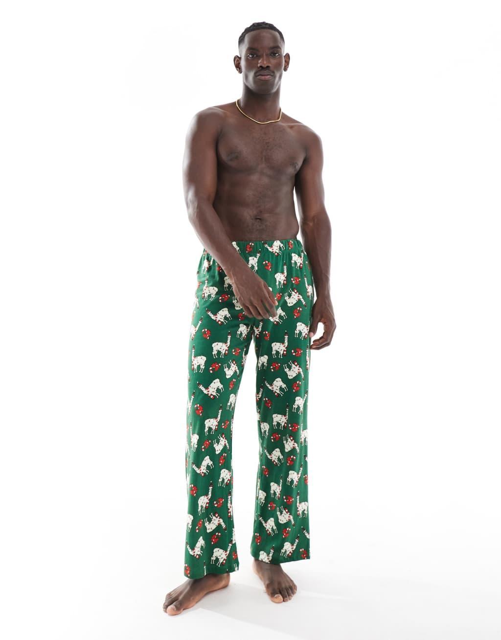 ASOS DESIGN christmas llama lounge pants in dark green Product Image