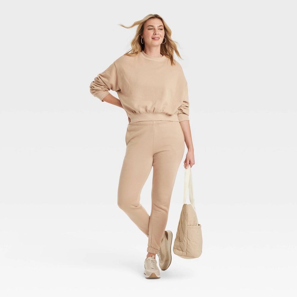 Women's Leisure Studio Pullover Sweatshirt - Universal Thread™ Tan S Product Image