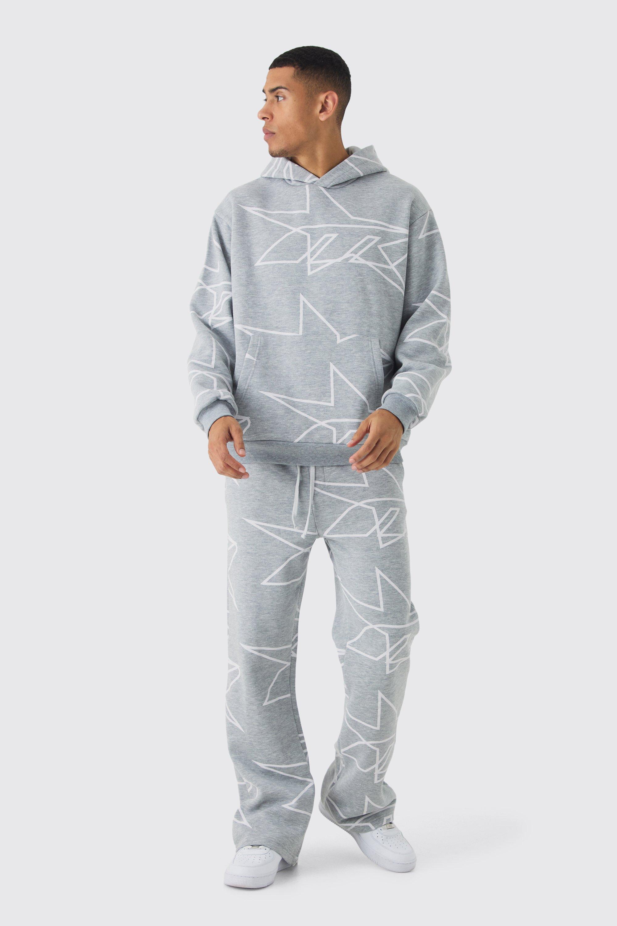 Oversized Star All Over Printed Gusset Flare Hooded Tracksuit | boohooMAN USA Product Image