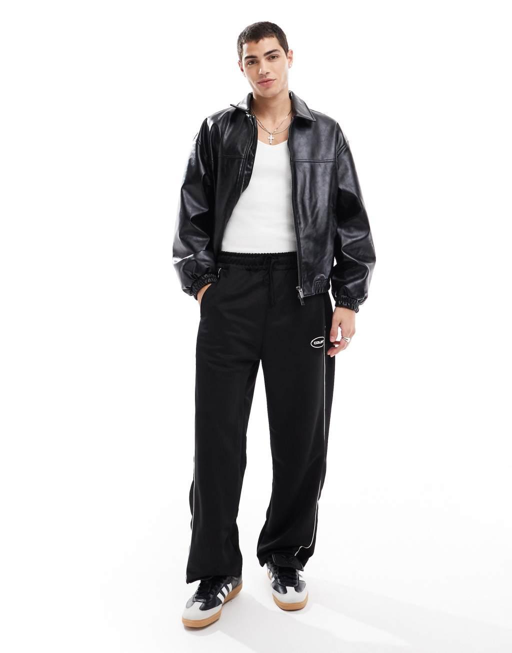 Bershka retro piped wide leg sweatpants in black product image