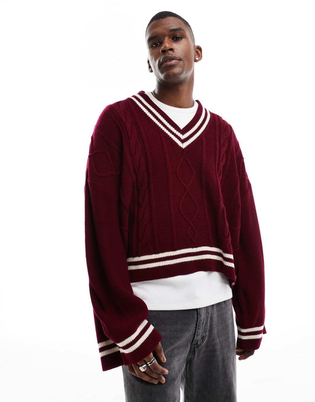 ASOS DESIGN knitted extreme oversized cropped v neck sweater in burgundy with tipping Product Image