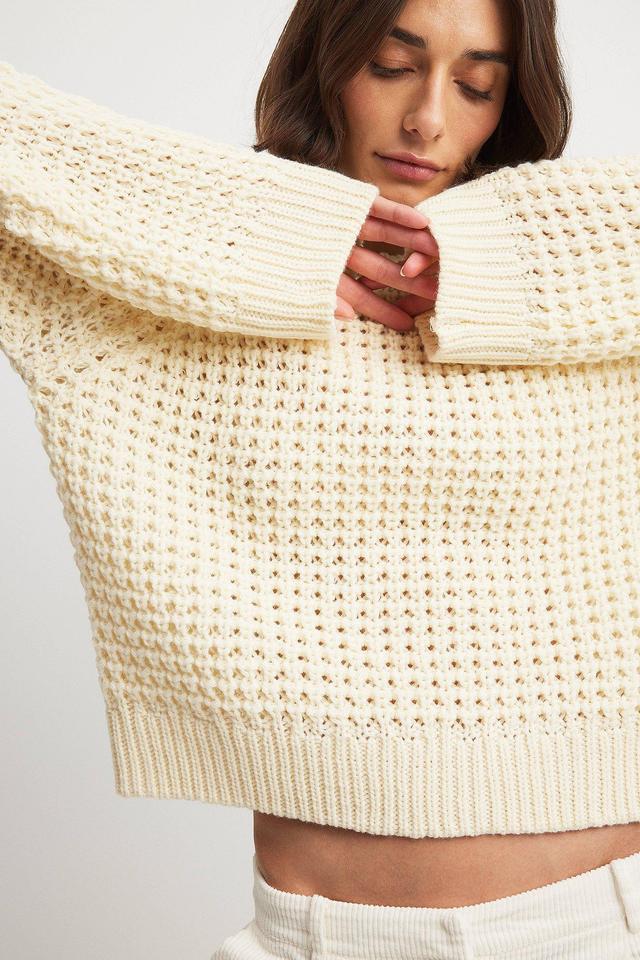 Round Neck Knitted Sweater Product Image