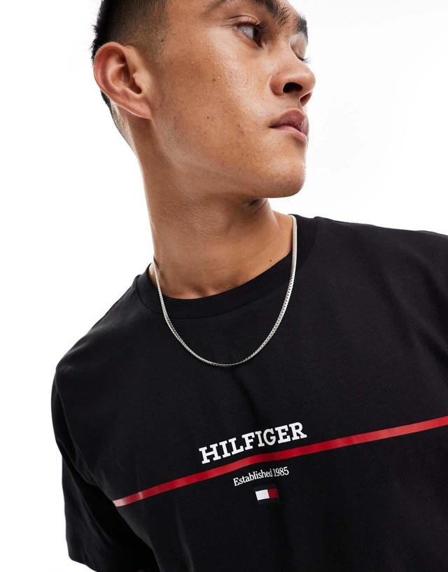 Tommy Hilfiger stripe logo t-shirt in black Product Image