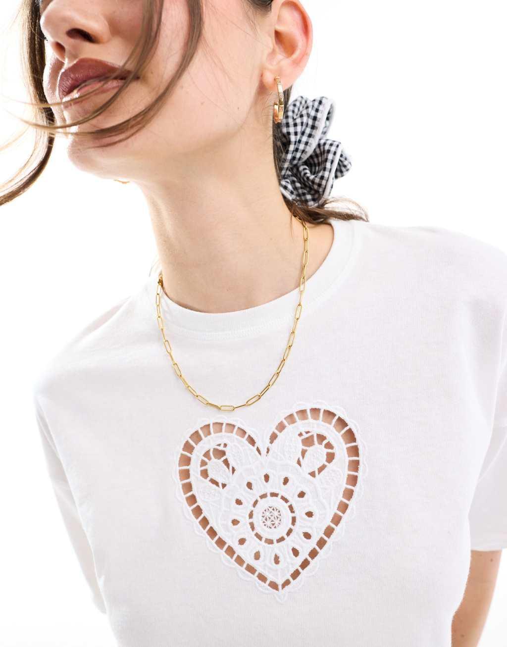 Miss Selfridge short sleeve cropped t-shirt with heart eyelet detail in white Product Image