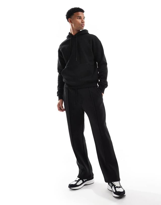 Bershka jersey hoodie and wide leg sweatpants in black Product Image