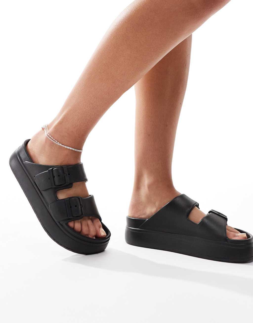 ASOS DESIGN Freestyle flatform double buckle footbed sliders in black Product Image