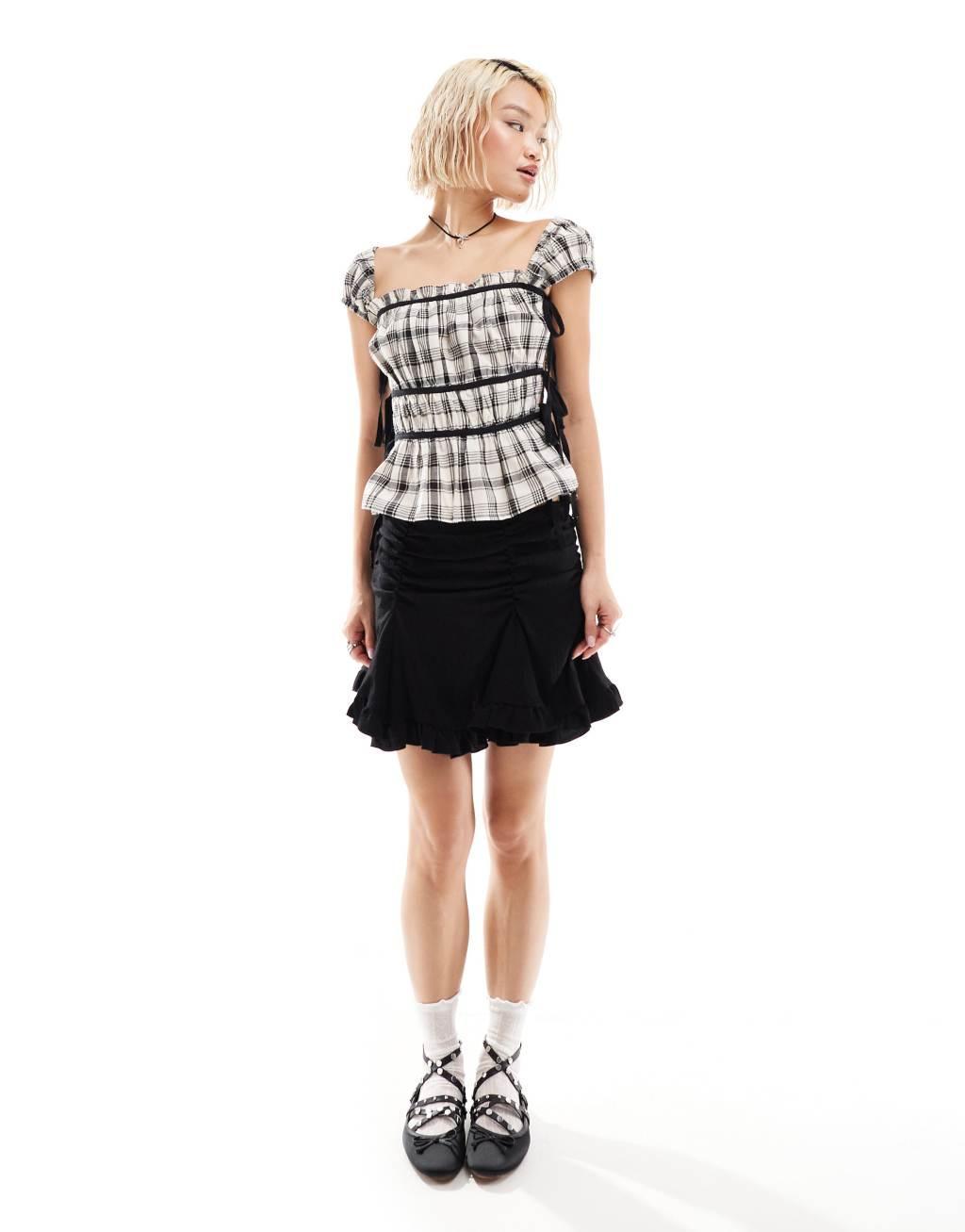 COLLUSION milkmaid top with open bow side in mono check Product Image