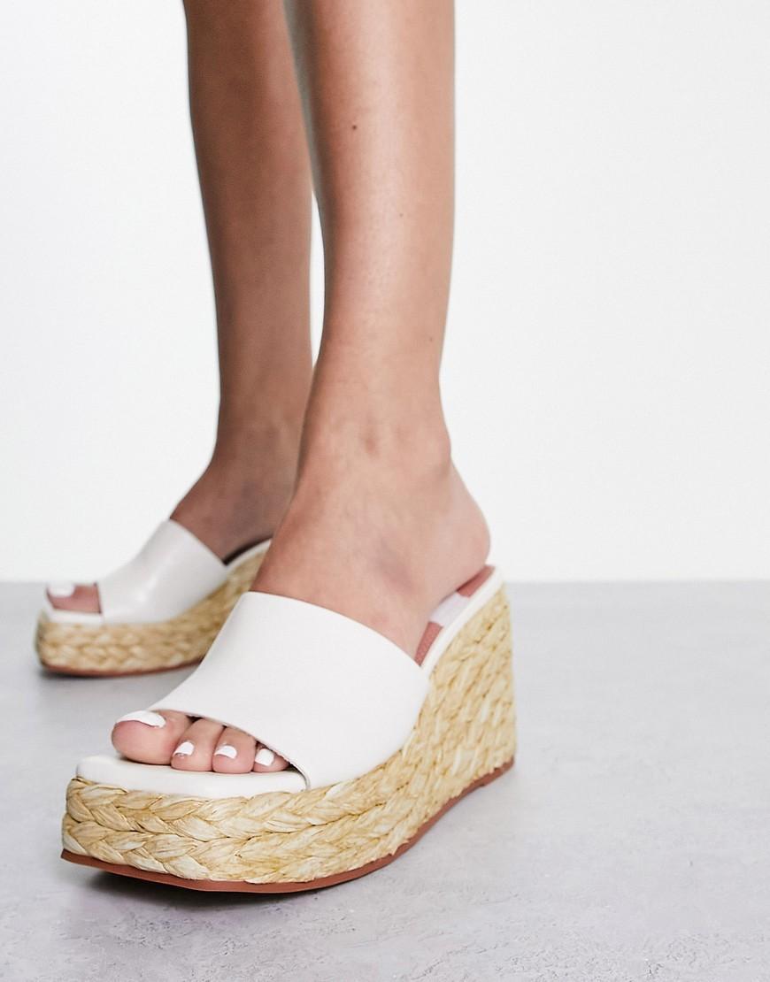 ASOS DESIGN Teo wedge mules in white  Product Image