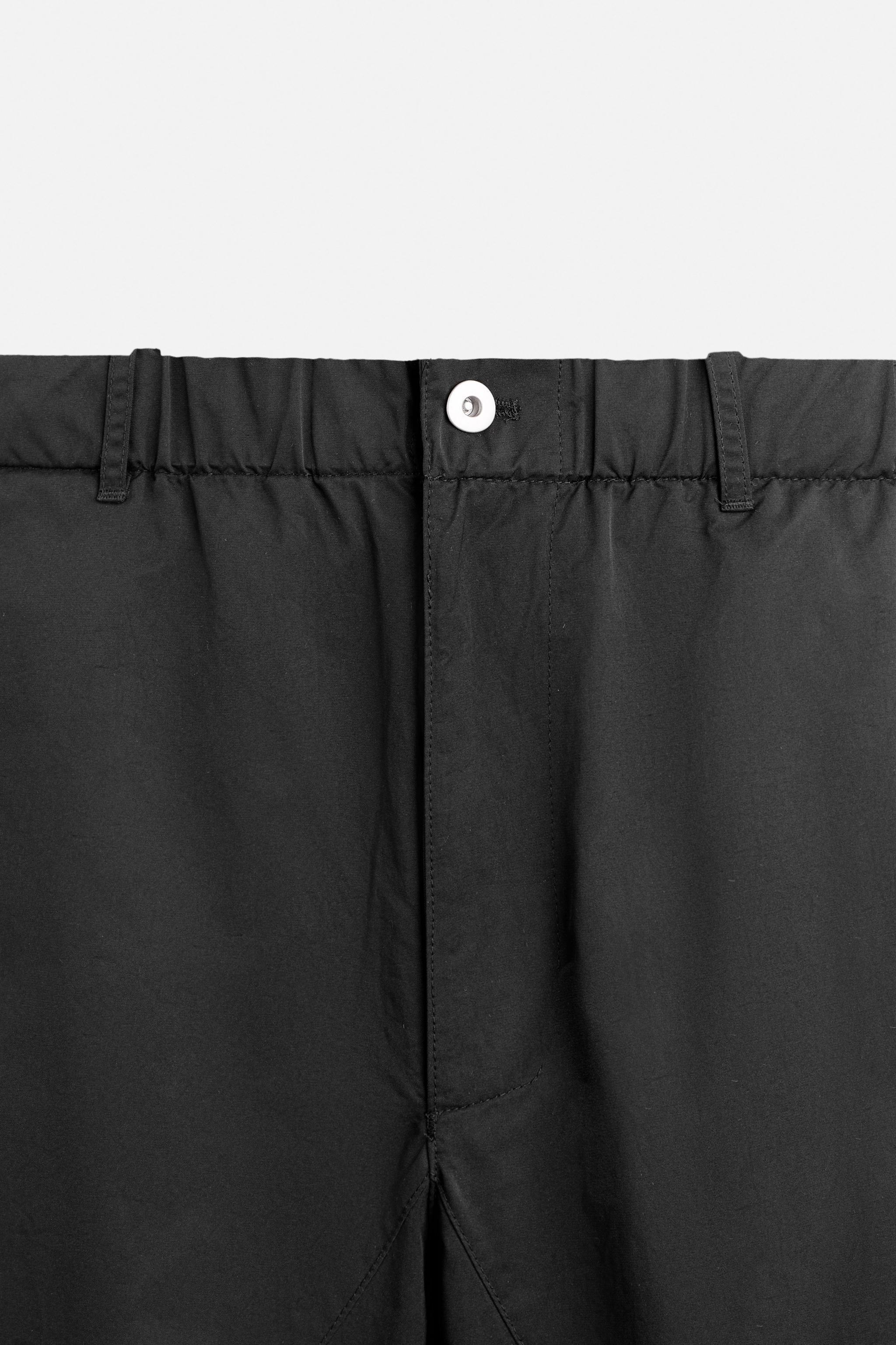 TECHNICAL PARACHUTE PANTS Product Image