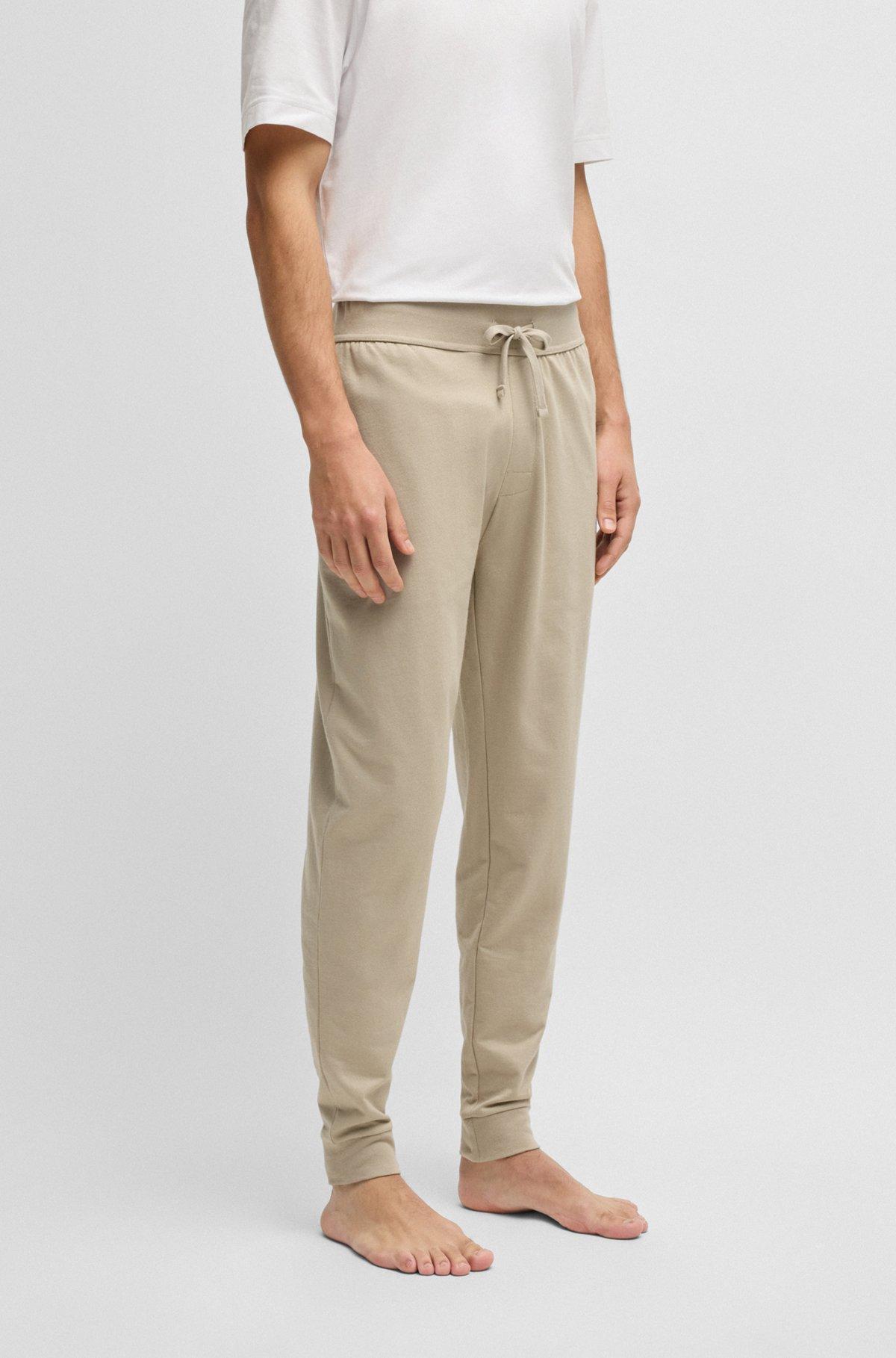 BOSS - Drawcord tracksuit bottoms in cotton terry with logo print - Light Beige Product Image