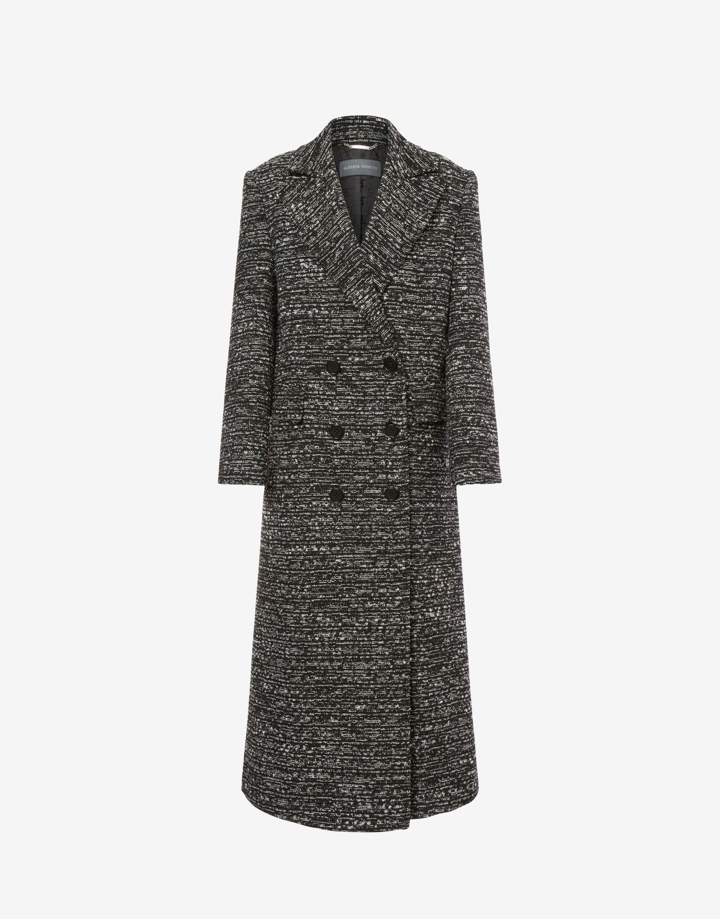 Buttoned tweed double-breasted coat. Product Image