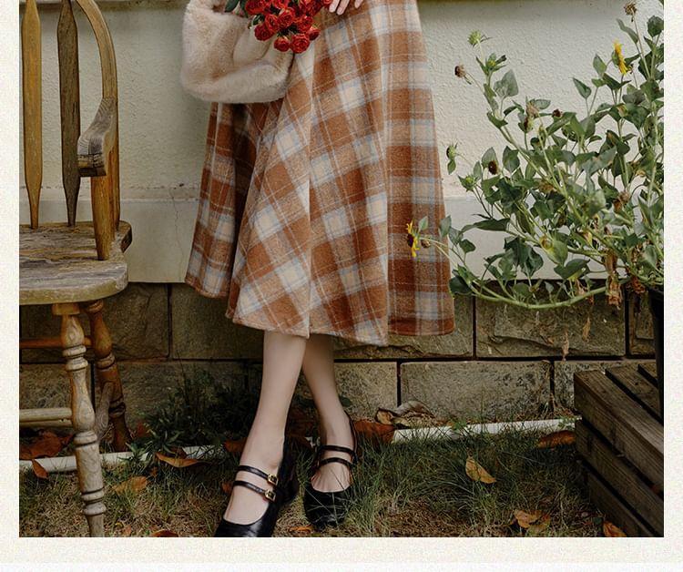 Set: Long-Sleeve Plain Knit Top + Stand Collar Button-Up Capelet + High Rise Plaid Midi A-Line Skirt Product Image