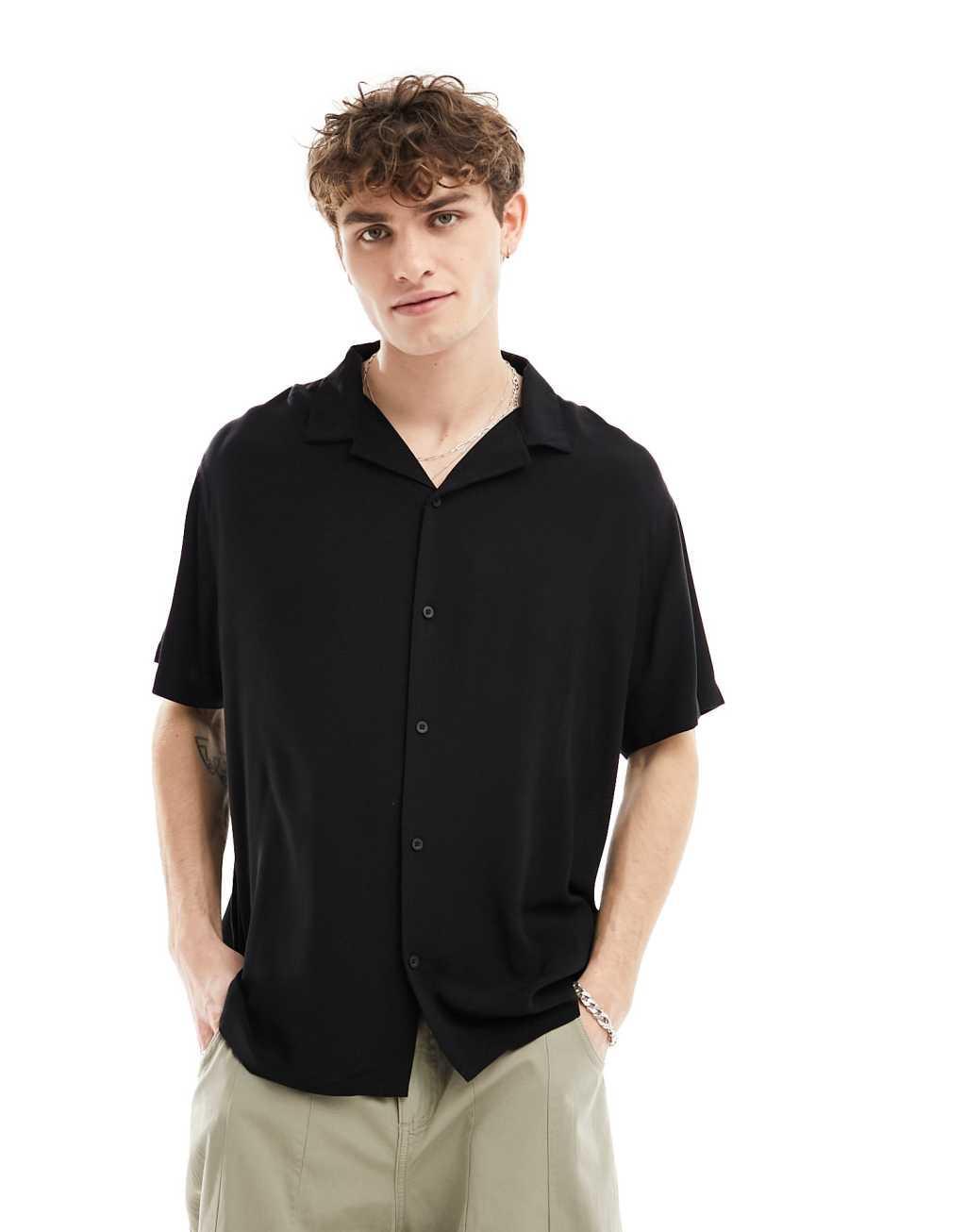 Reclaimed Vintage viscose revere shirt in black Product Image