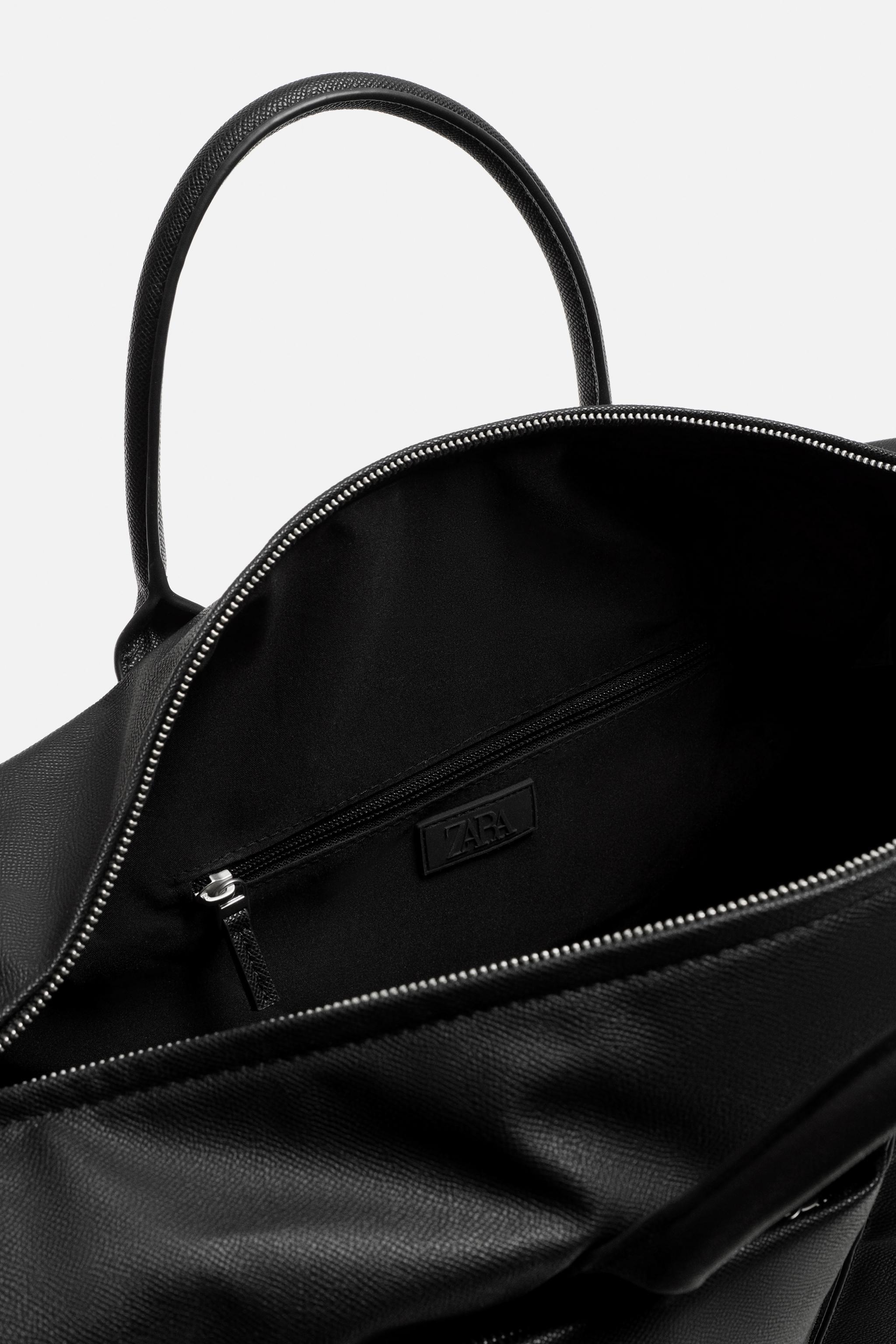 TRAVEL BAG WITH POCKETS Product Image