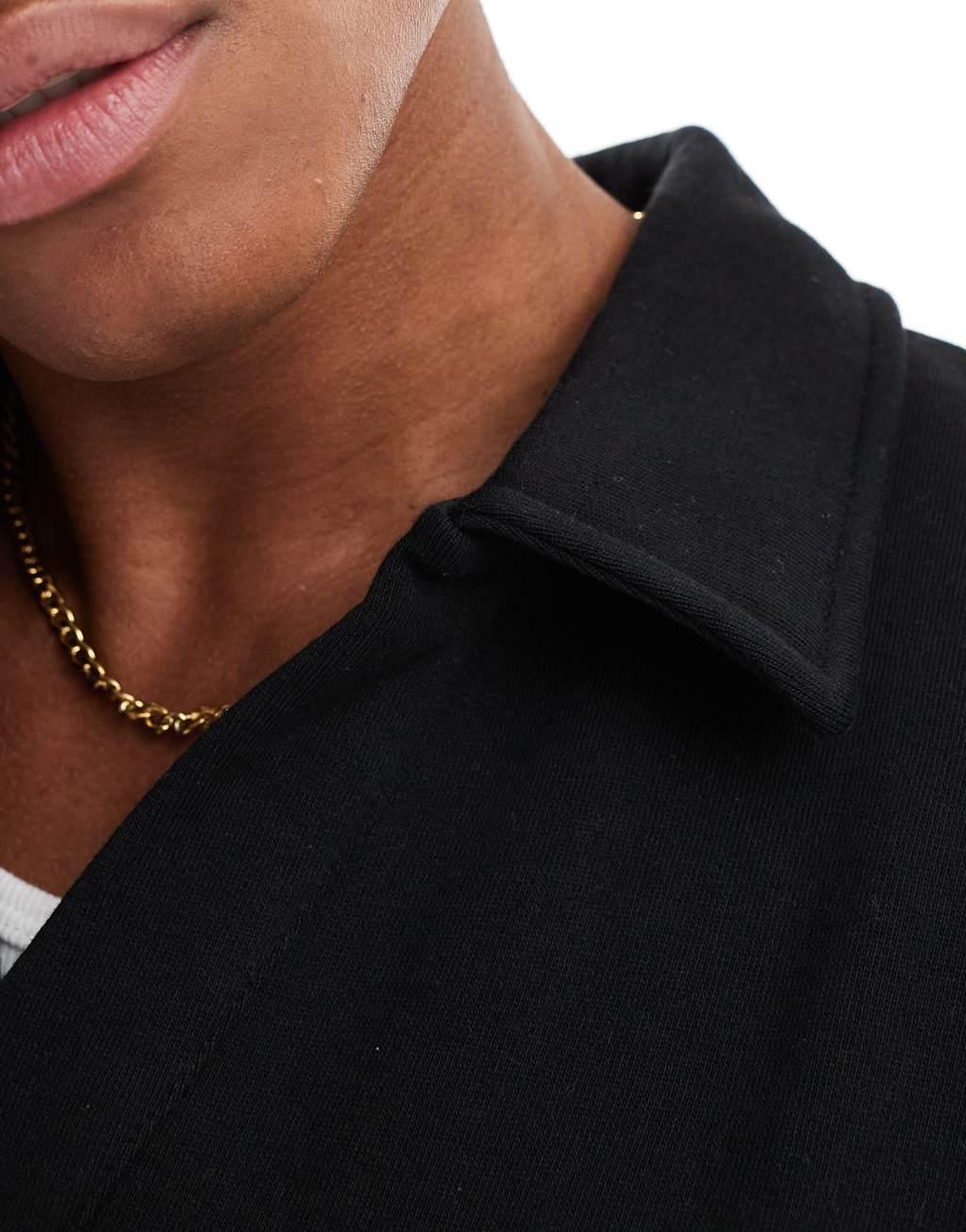 ASOS DESIGN boxy oversized polo sweatshirt in black Product Image