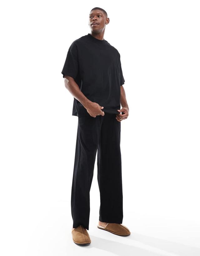 ASOS DESIGN jersey pajama set with oversized t-shirt and pants in black Product Image