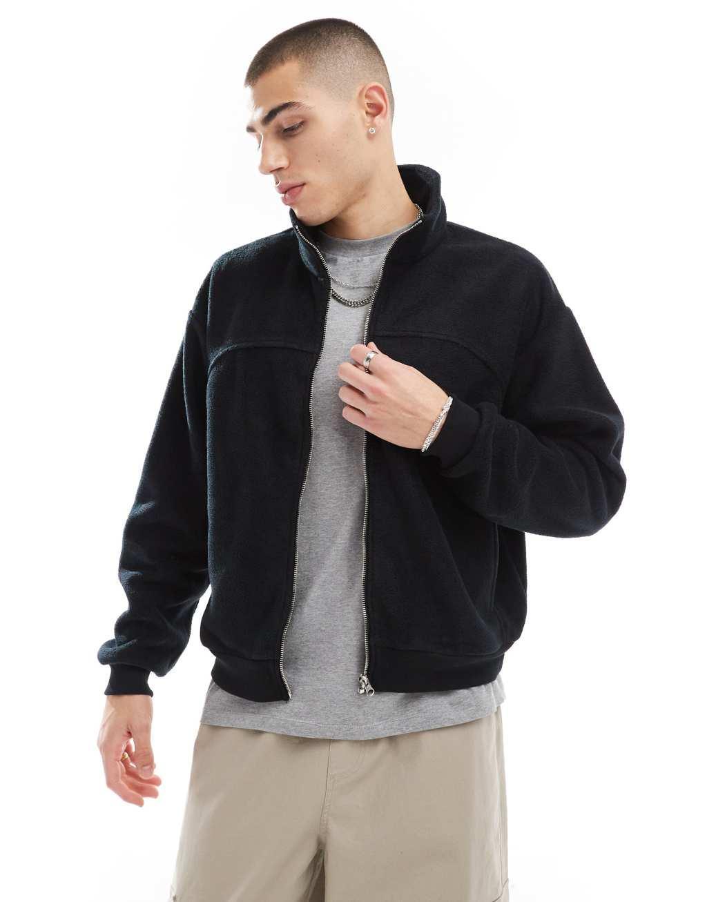 ASOS DESIGN cropped fleece track jacket in black Product Image