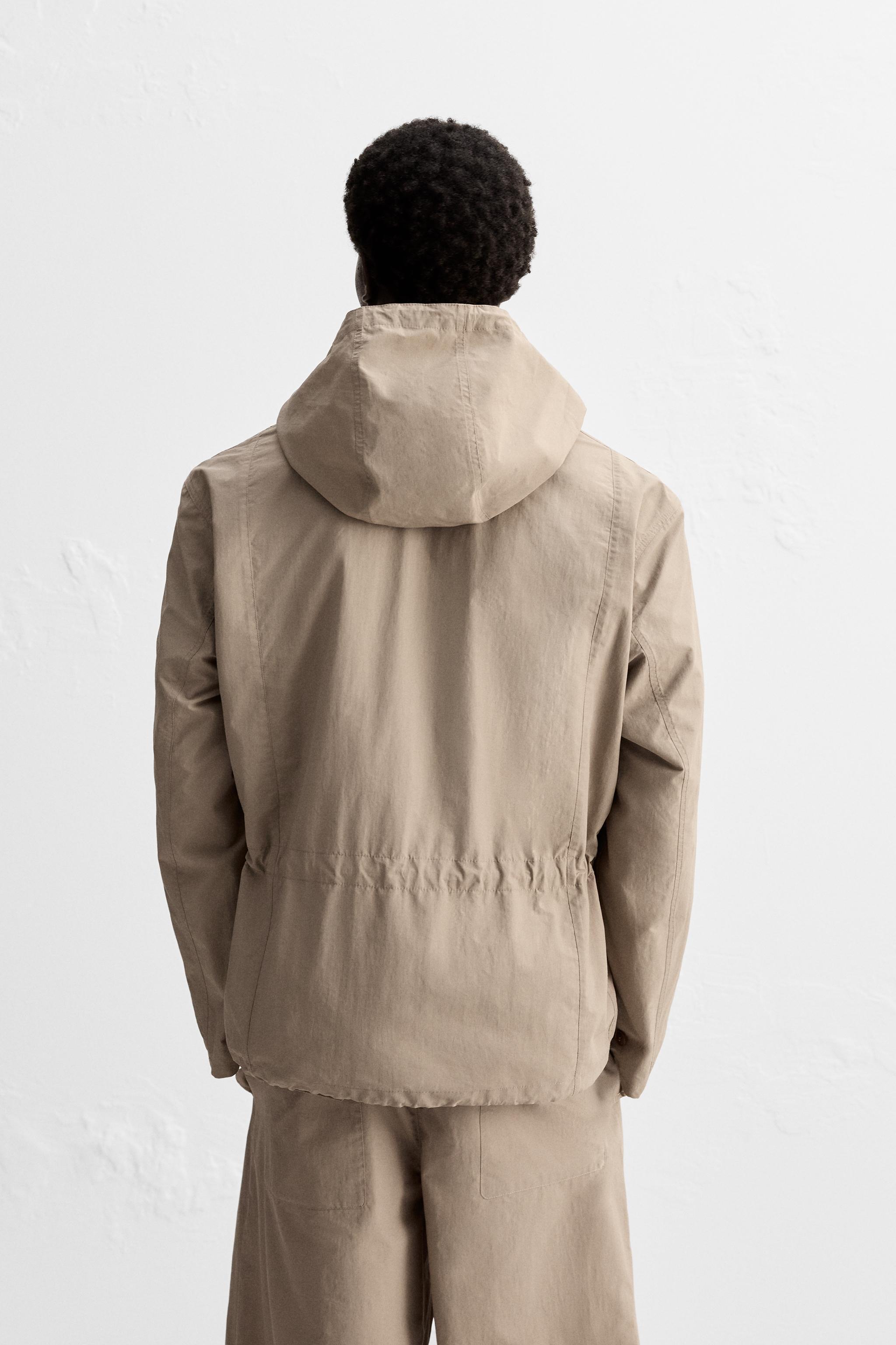 WATER REPELLENT TECHNICAL JACKET WITH POUCH POCKET Product Image