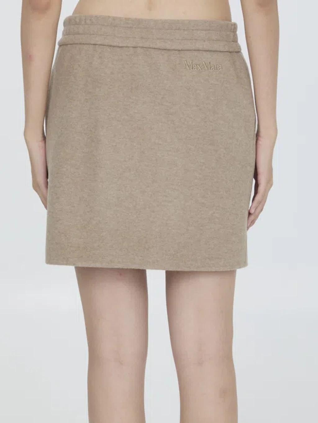 Onagro Miniskirt In Beige Product Image