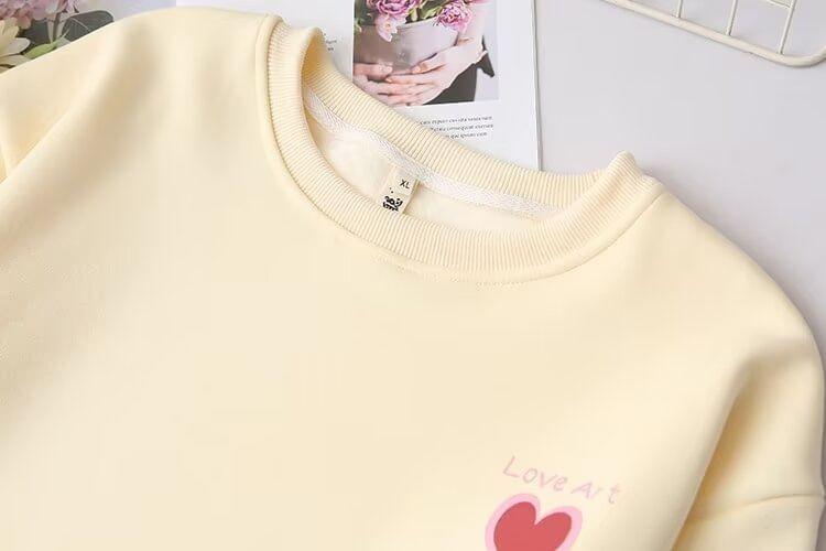 Plus Size Round Neck Heart Print Fleece-Lined Pullover Product Image