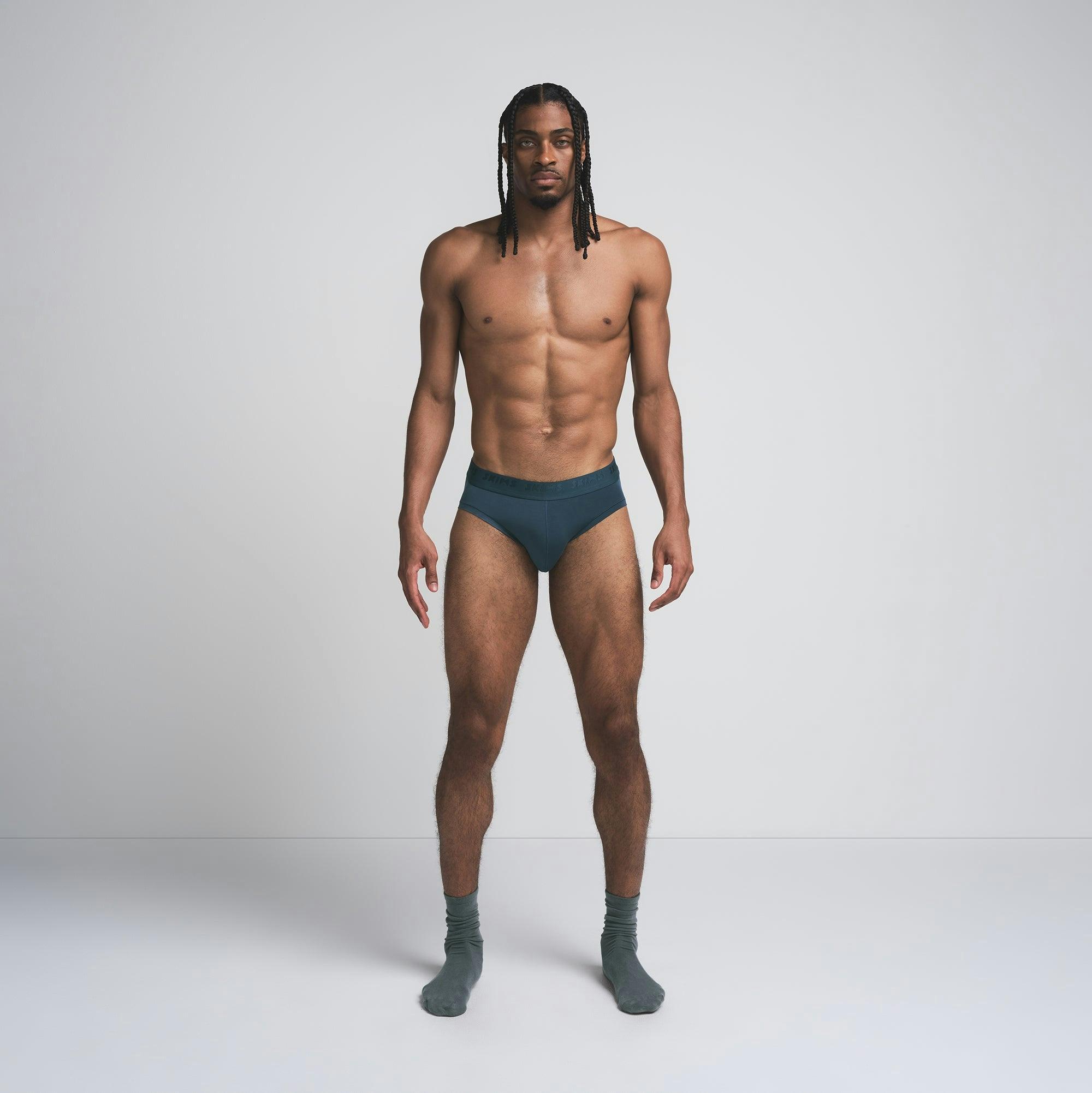 SKIMS STRETCH MENS BRIEF | INDIGO Product Image