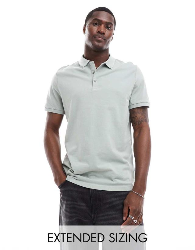 ASOS DESIGN pique polo in light green Product Image