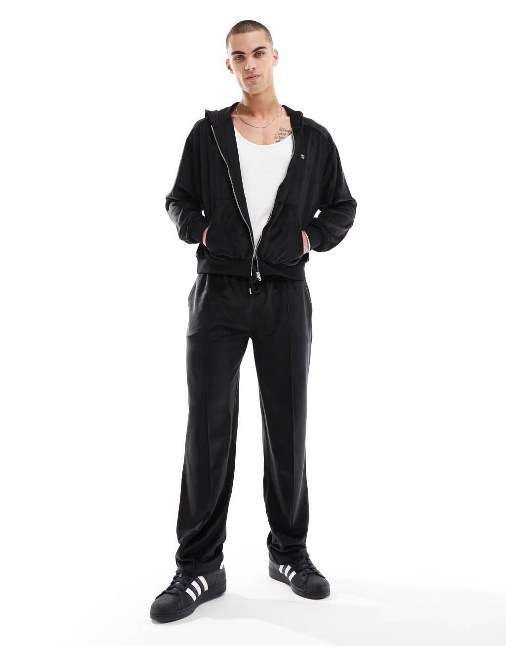 ASOS DESIGN straight leg velour sweatpants in black Product Image