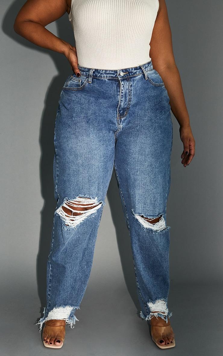 PRETTYLITTLETHING Plus Mid Blue Extreme Ripped Hem Knee Rip Mom Jeans Product Image