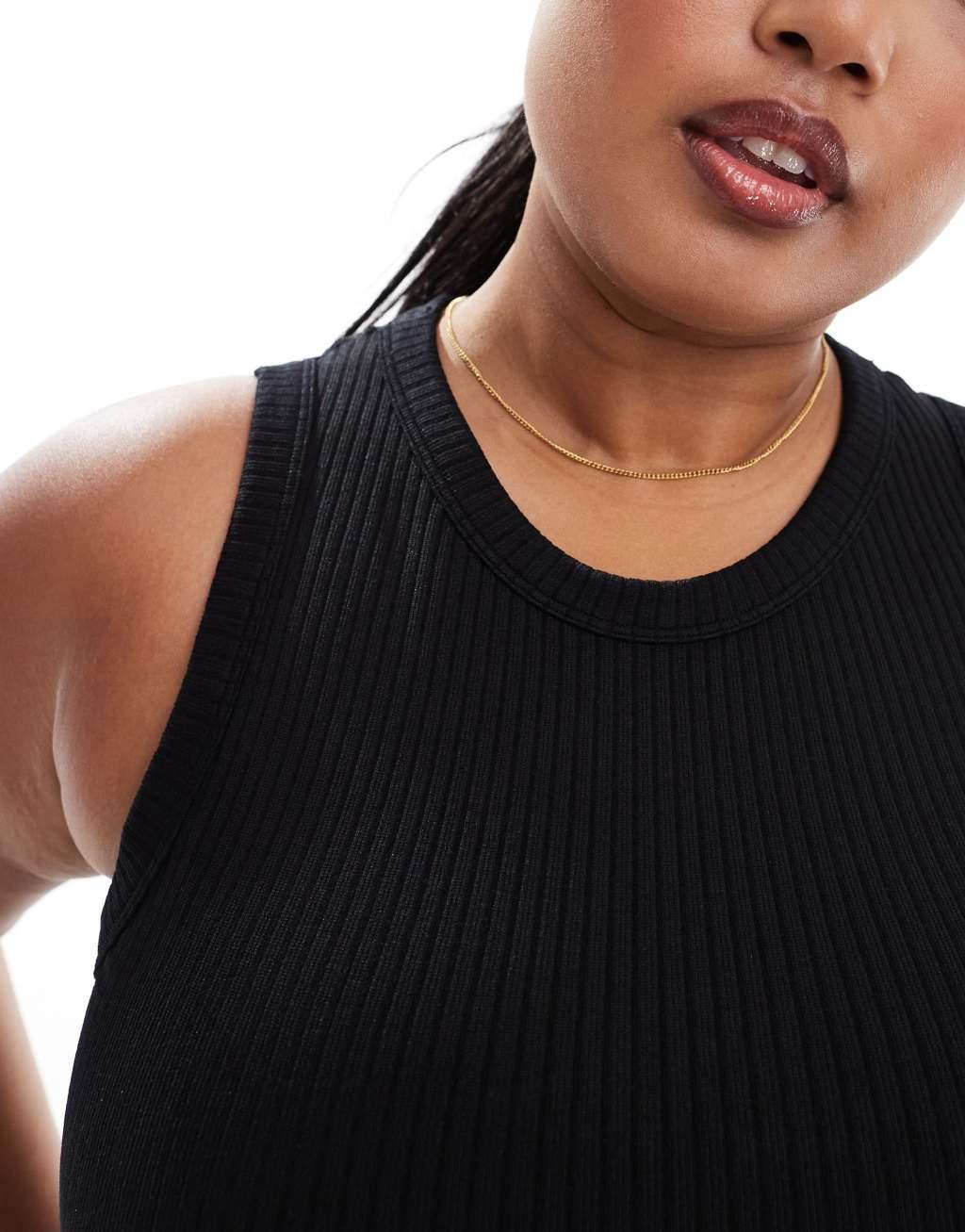 ASOS 4505 Curve Icon seamless rib 90s cropped tank top in black Product Image