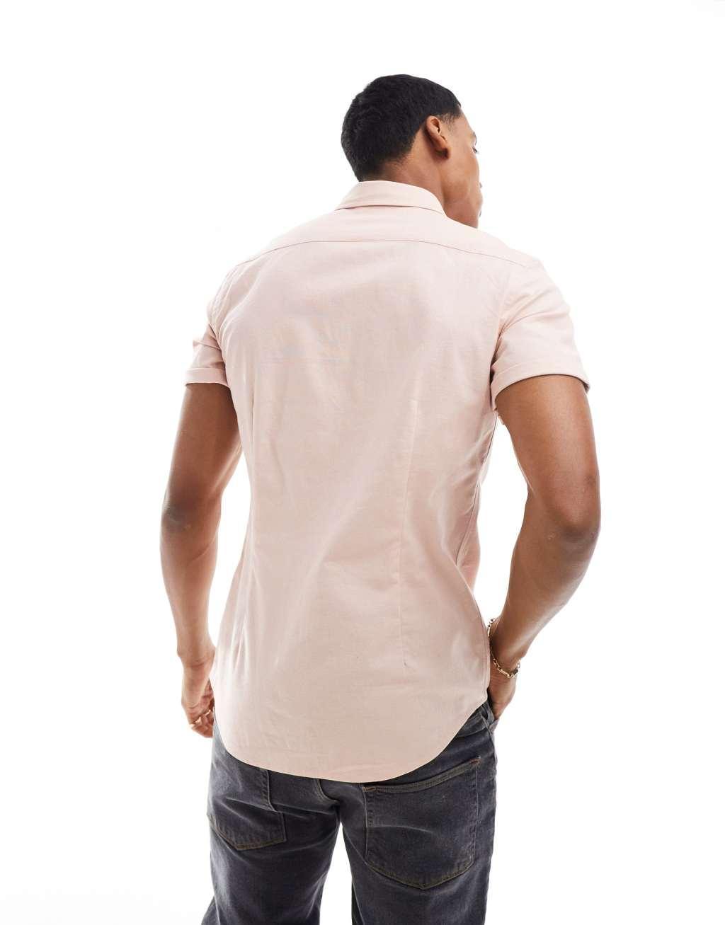 ASOS DESIGN short sleeve slim fit oxford shirt in light pink Product Image