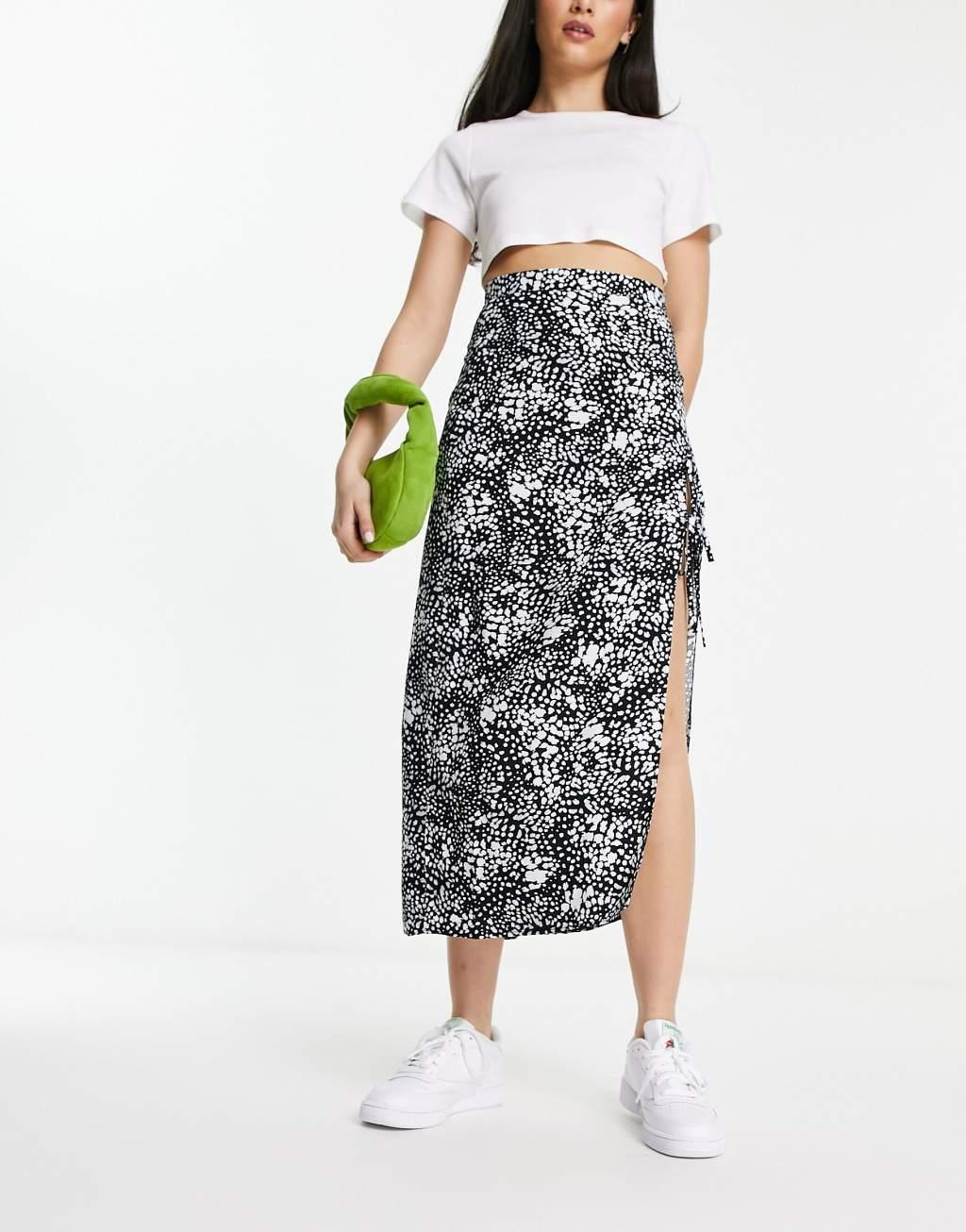 ASOS DESIGN bow detail midi skirt with thigh split in mono smudge print Product Image