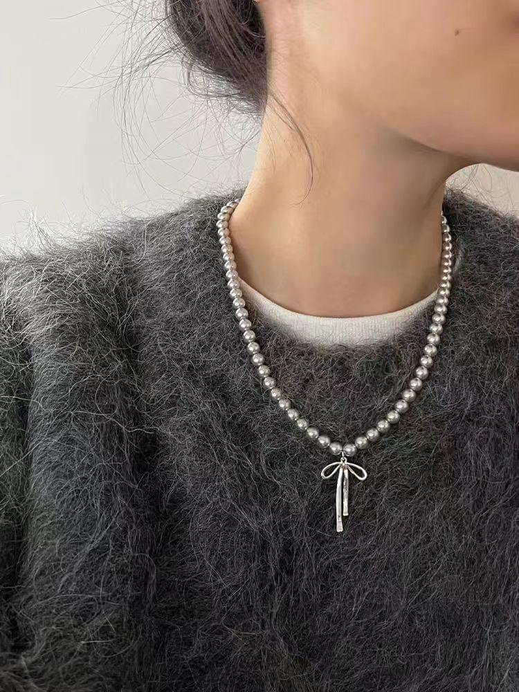 Bow Pendant Faux Pearl Necklace Product Image