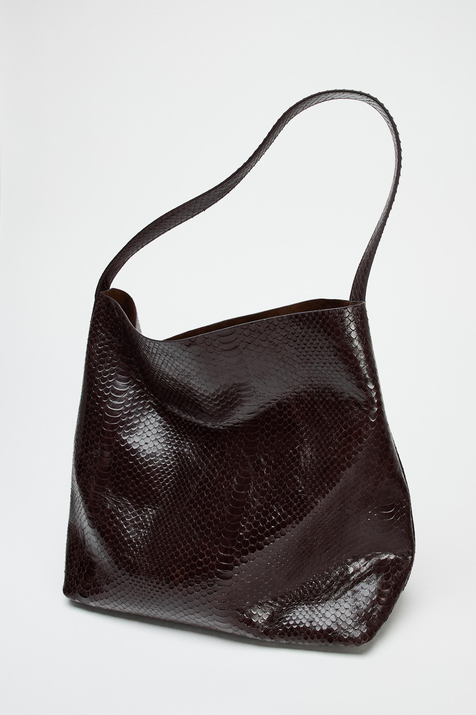 EMBOSSED LEATHER MAXI BUCKET BAG Product Image