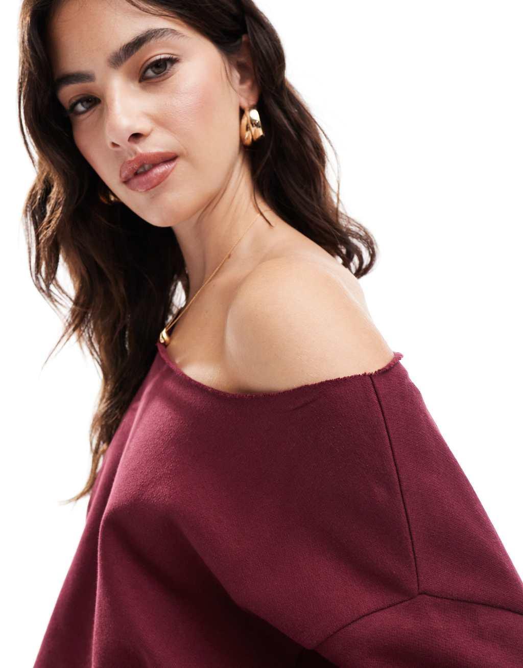 ASOS DESIGN off shoulder sweatshirt in burgundy Product Image