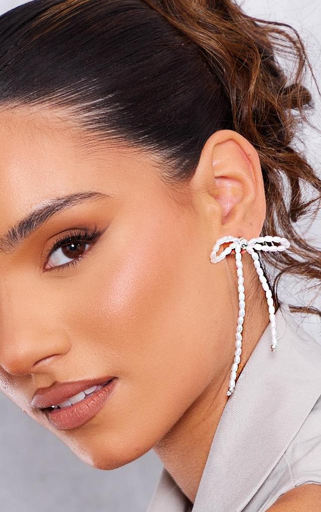 Silver Beaded Bow Tassel Earrings Product Image