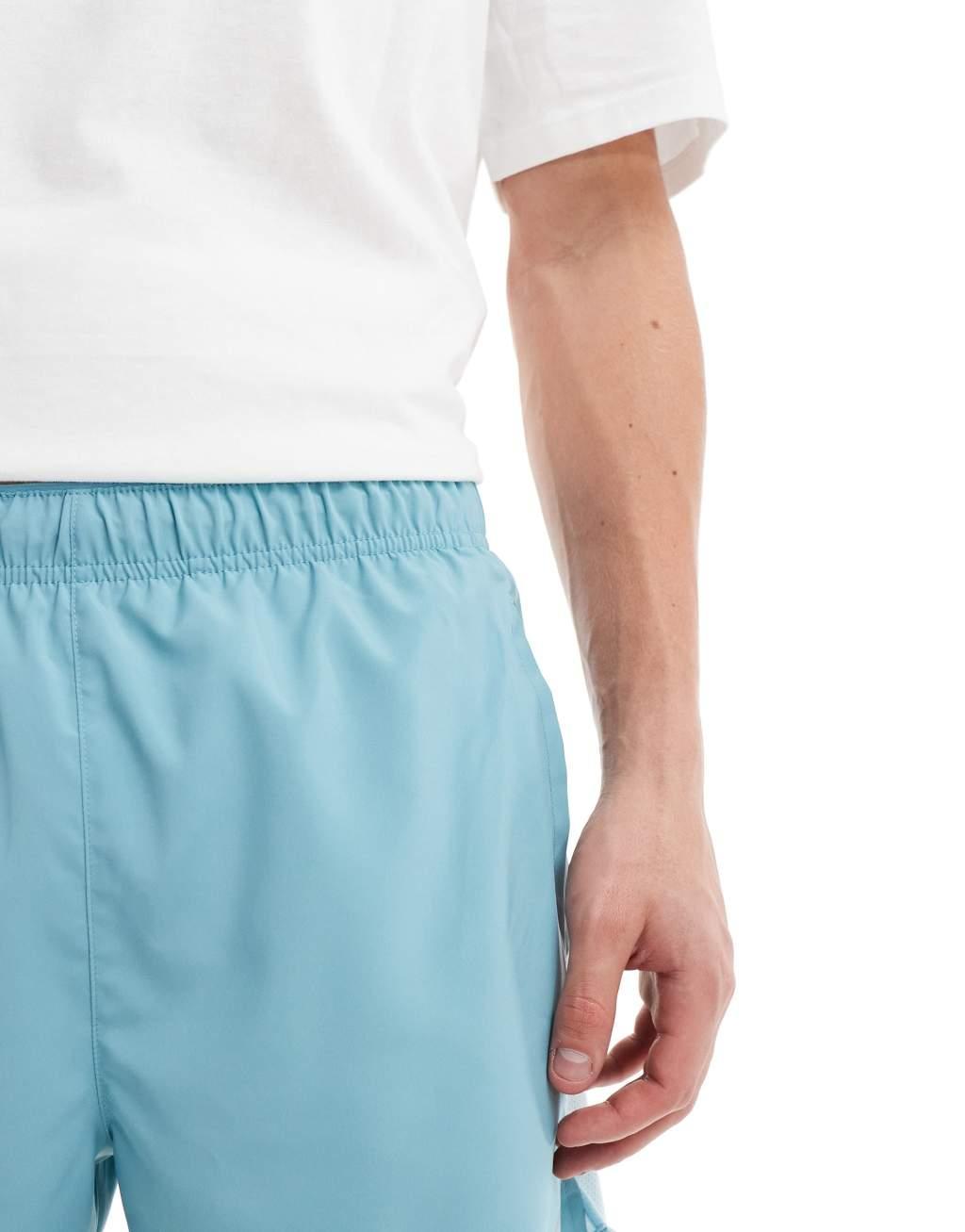 Nike Running Challenger Dri-FIT 5 inch shorts in light blue Product Image