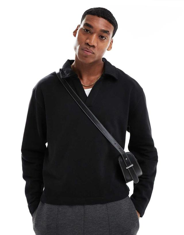 ASOS DESIGN boxy oversized polo sweatshirt in black Product Image