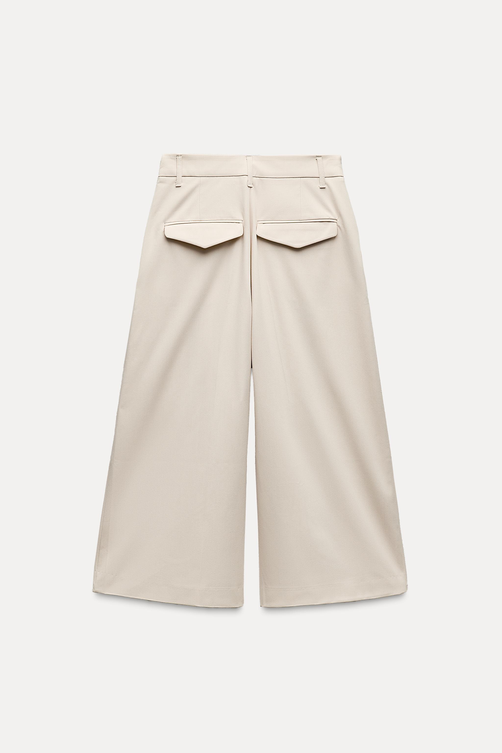 PLEATED SHORTS Product Image